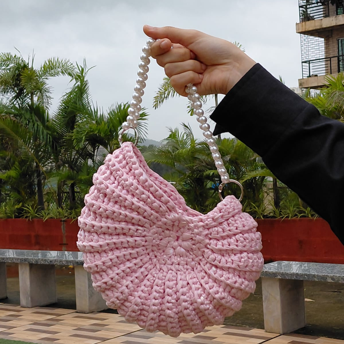 Handmade pink crochet shell bag with a pearl strap. Elegant beach purse.

