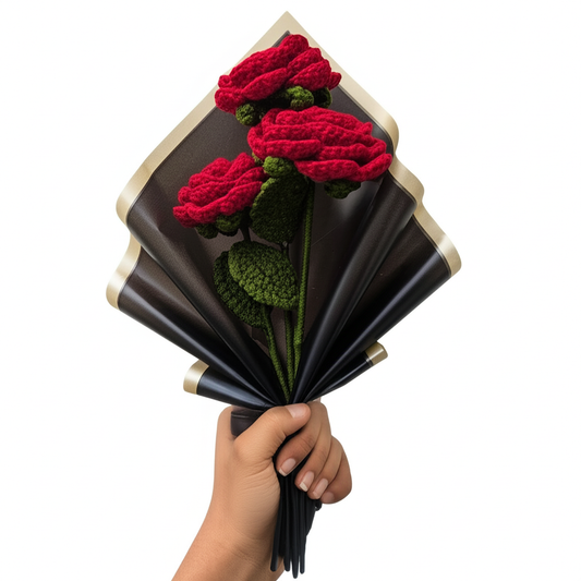 Handmade crochet red rose bouquet wrapped in black paper with a red ribbon, unique gift for special occasions.